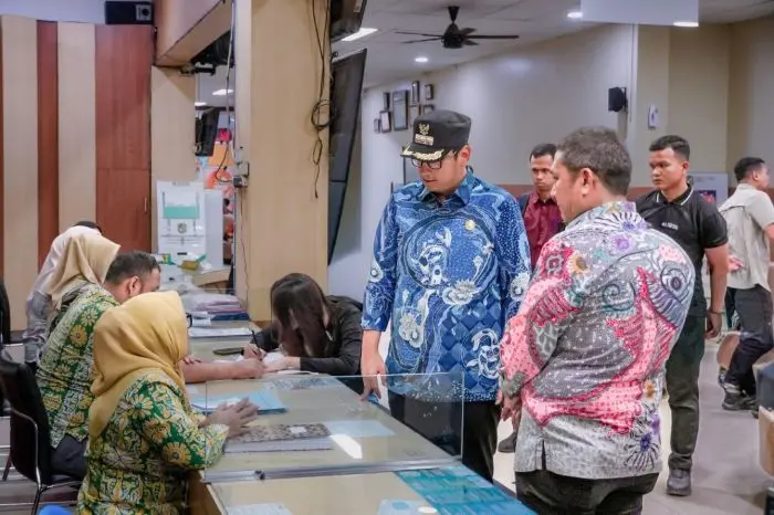 pemko_medan_permudah_pengurusan_dokumen_warga_terdampak_banjir_2025-12-04_18-00-49_8028